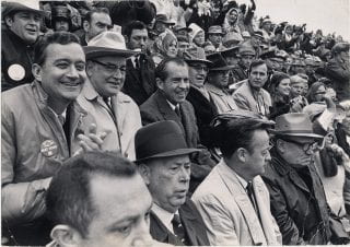Nixon adn others at Razorback Stadium.